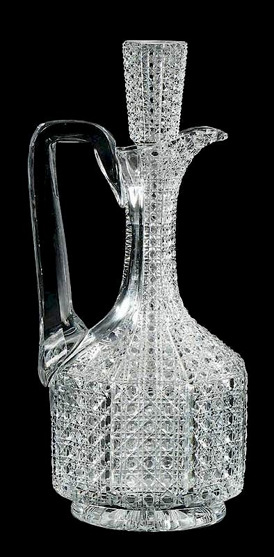 Appraisal: Cut Glass Handled Decanter Maple City caned pattern with matching