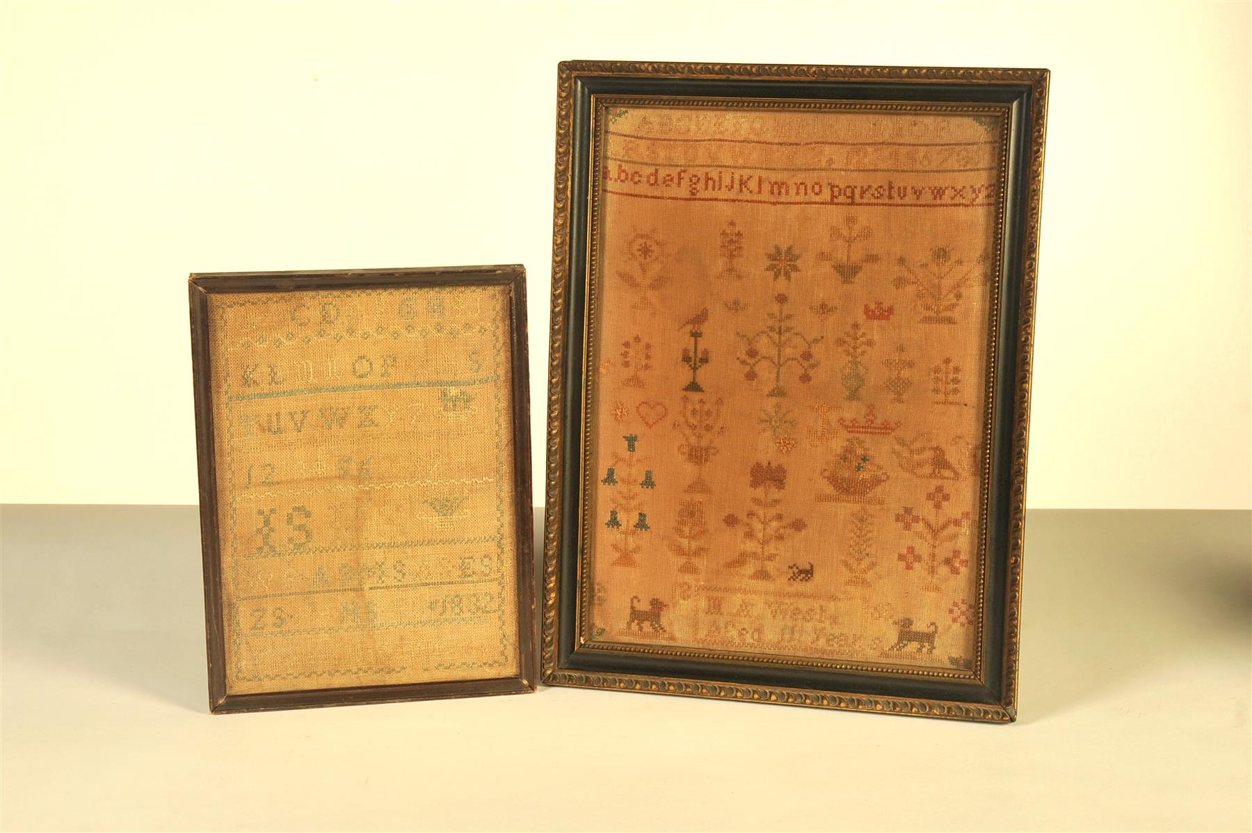 Appraisal: TWO FRAMED SAMPLERS First half- th century Linen with silk