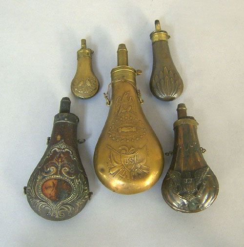 Appraisal: Five brass and copper powder flasks