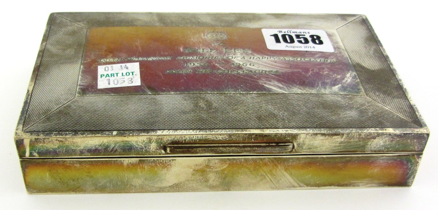 Appraisal: A silver table cigarette box wooden lined within the hinged