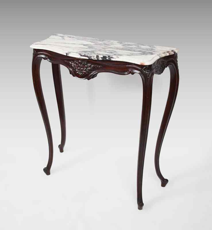 Appraisal: TALL MAHOGANY CARVED CONSOLE WITH MARBLE TOP Shaped marble top