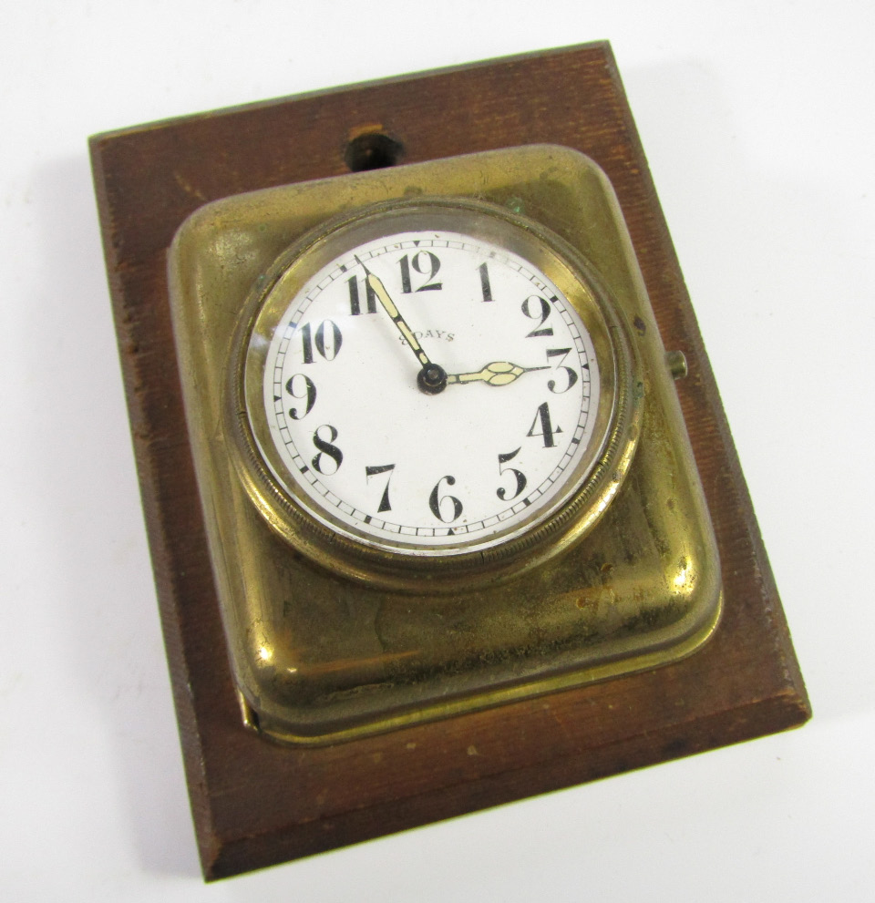 Appraisal: An early thC French brass cased wall mounted bedroom clock