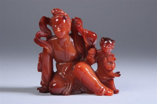 Appraisal: CHINESE CARNELIAN FIGURE GROUP Carved to depict meiren and child