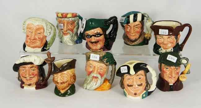 Appraisal: Royal Doulton Miniature Character Jugs Robinson Crusoe D Robin Hood