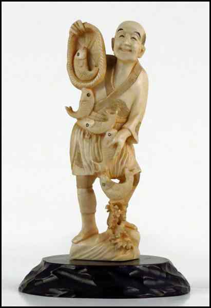 Appraisal: JAPANESE CARVED IVORY FIGURE OF A FISHERMAN Provenance The Collection