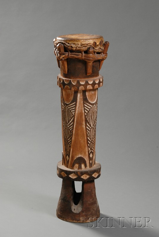 Appraisal: African Carved Wood Drum possibly Fang openwork base with kaolin-filled