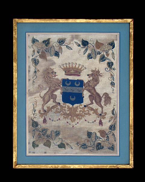 Appraisal: A framed Continental needlework armorial panel th th century Centering