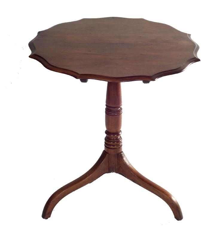 Appraisal: th CENTURY MAHOGANY TRIPOD TABLE the scalloped circular top raised