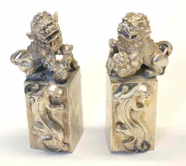 Appraisal: PAIR CHINESE SILVER SEAL STAMPS the weighted cubes having matching