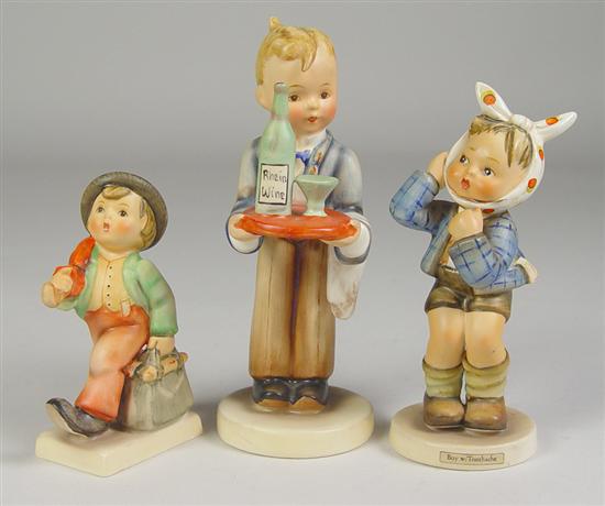 Appraisal: Three Hummel Figurines Waiter trademark - high Boy with Toothache