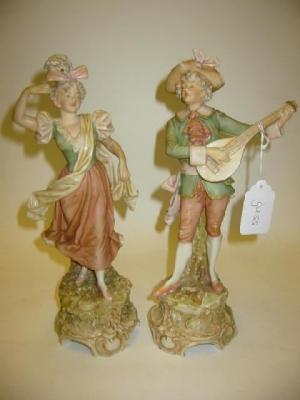 Appraisal: A PAIR OF ROYAL DUX PORCELAIN FIGURES of an th