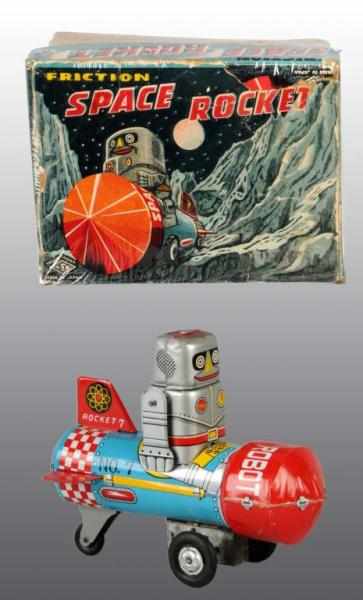 Appraisal: Tin Space Rocket Friction Toy Description Japanese Working Marked Space