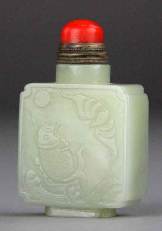 Appraisal: Chinese Qing Carved Celedon Jade Snuff BottleFinely carved on one