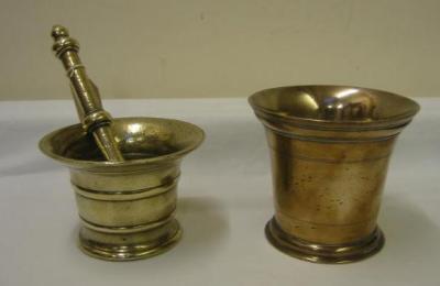 Appraisal: A COPPER MORTAR with moulded top and base and incised