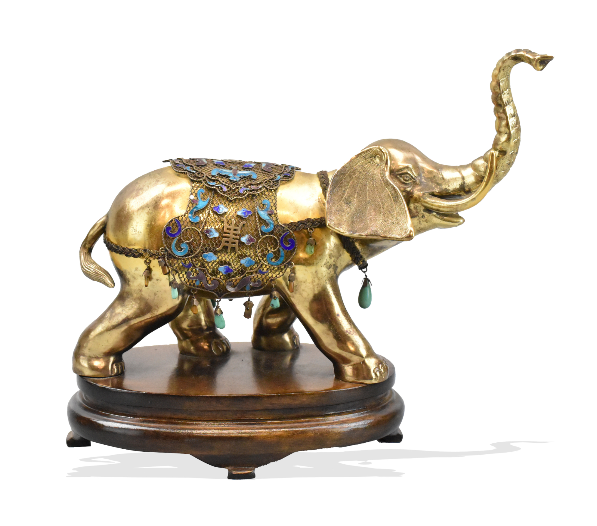 Appraisal: A Chinese gilt silver elephant on a wooden stand The