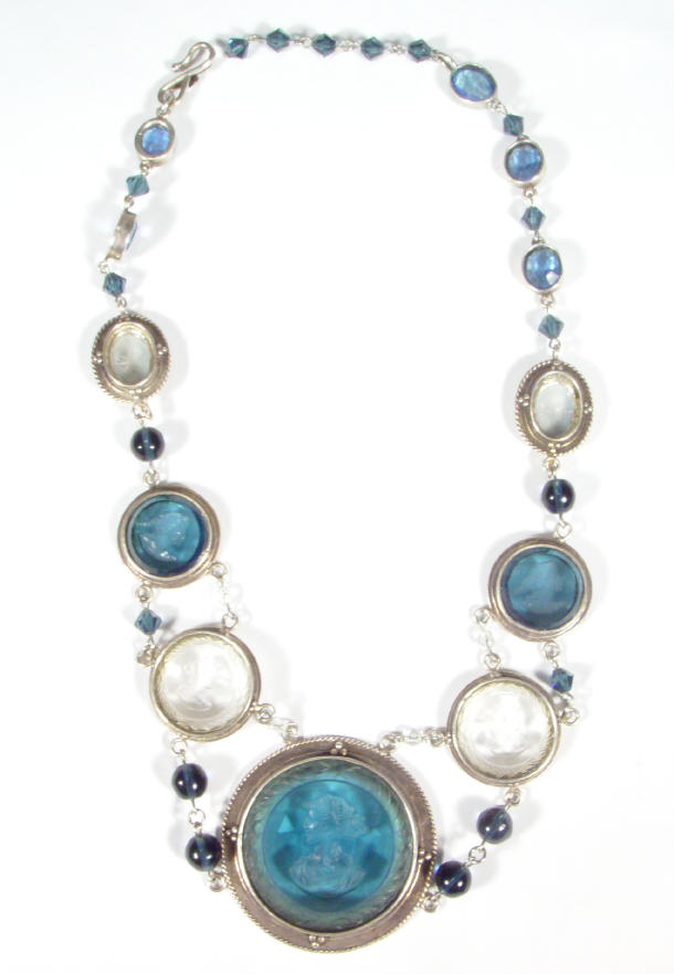 Appraisal: Silver intaglio blue clear glass necklace carved with Grecian ladies'