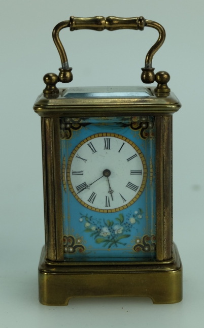 Appraisal: Cased Carriage clock with blue enameled panels to all sides