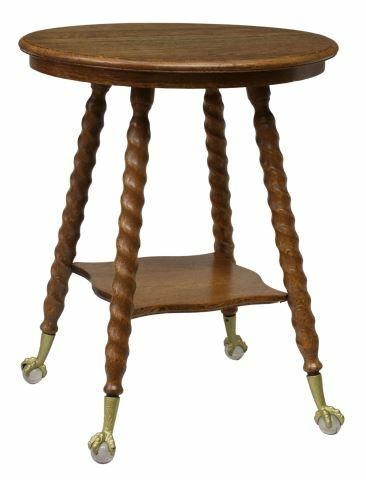 Appraisal: American Late Victorian oak parlor table c circular tabletop rising