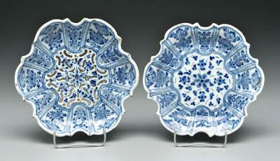 Appraisal: Two Delft dishes one with scalloped border floral decoration on