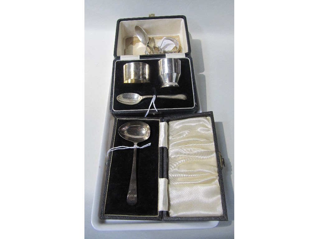 Appraisal: Lot comprising cased three piece silver christening set silver spoon