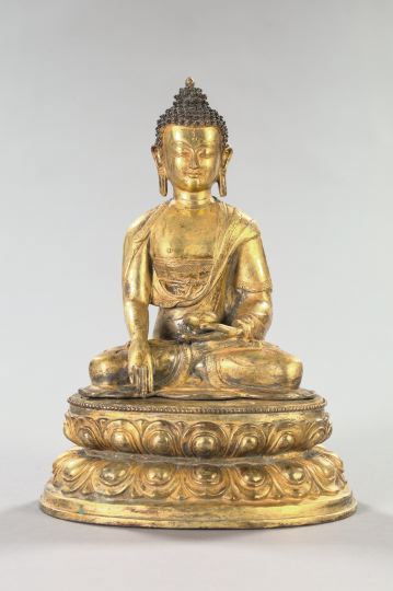 Appraisal: Good Two-Piece Tao-Kuang Parcel-Patinated and Gilt-Bronze Figure of Buddha second