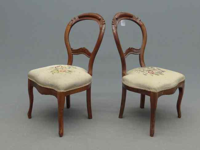 Appraisal: Pair Victorian balloon back chairs with needlepoint seats '' Seat