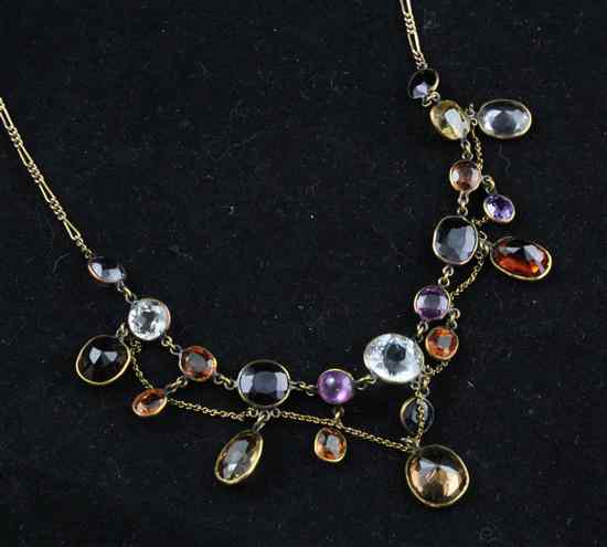 Appraisal: A gold mounted multi-gem set fringe necklace set with amethyst