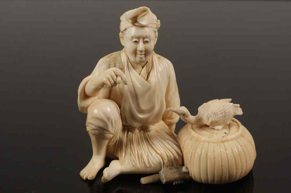 Appraisal: JAPANESE IVORY FIGURE - Meiji Period Ivory Okimono of Seated