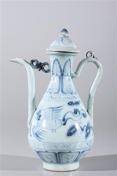 Appraisal: Chinese blue and white porcelain covered ewer with phoenix designs