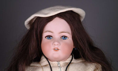 Appraisal: SIMON HALBIG JUTTA DOLL Blue glass sleep-eyed character child is