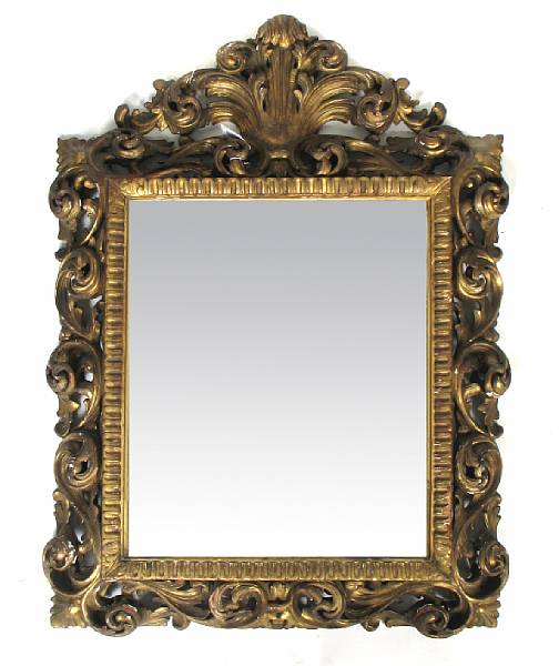 Appraisal: An Italian Baroque style carved giltwood mirror late th century