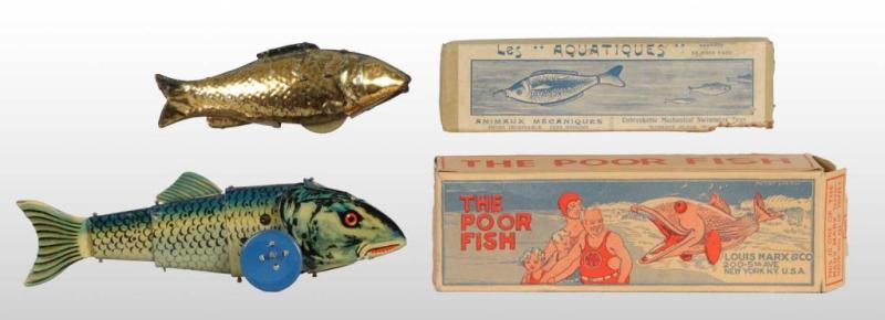 Appraisal: Lot of Tin Fish Toys Description Includes one Marx working