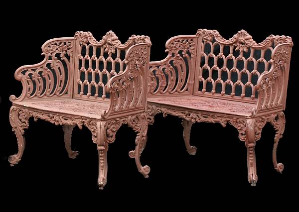 Appraisal: A pair of cast iron painted garden benches The shaped