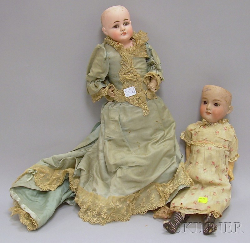 Appraisal: Armand Marseille Doll and Another Porcelain Headed Doll Armand Marseille