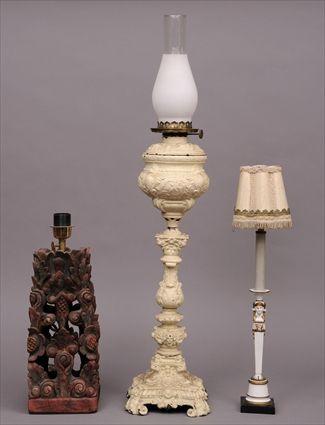 Appraisal: VICTORIAN PAINTED CAST-METAL KEROSENE LAMP The baluster-shaped standard rising from