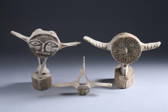 Appraisal: THREE INUIT CARVED WHALE BONE FIGURES th century Carved whale