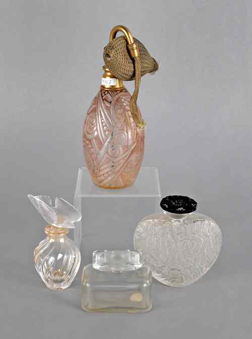 Appraisal: Two Lalique glass perfumes together with Robj atomizer and another