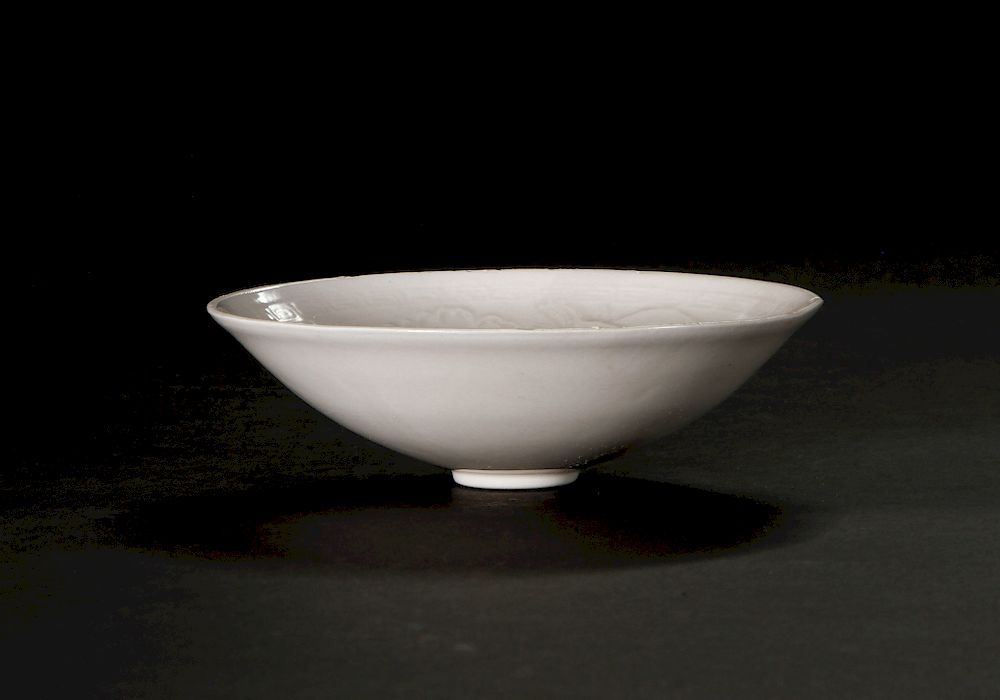 Appraisal: Ding Type 'Floral' Bowl The shallow rounded sides supported on