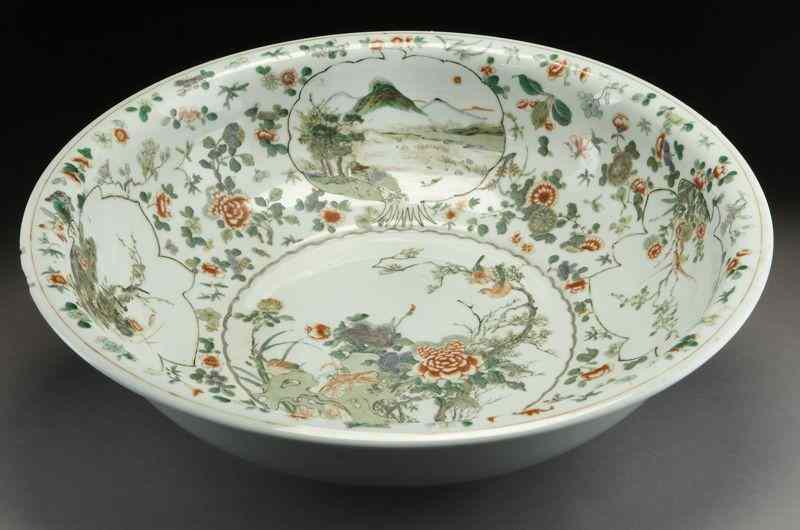 Appraisal: Chinese Qing Kangxi wucai porcelain wash basindepicting birds and flowers