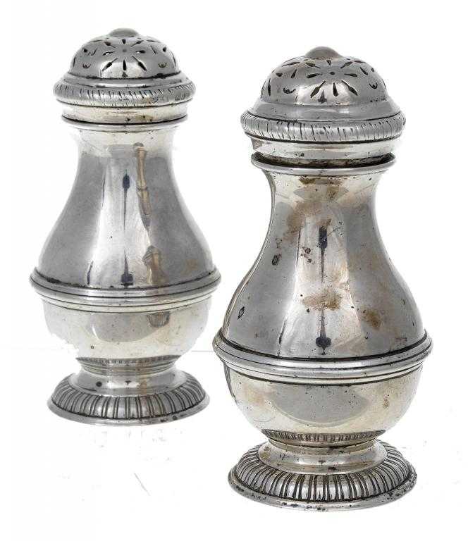 Appraisal: A PAIR OF GEORGE V BALUSTER PEPPER CASTERS with moulded