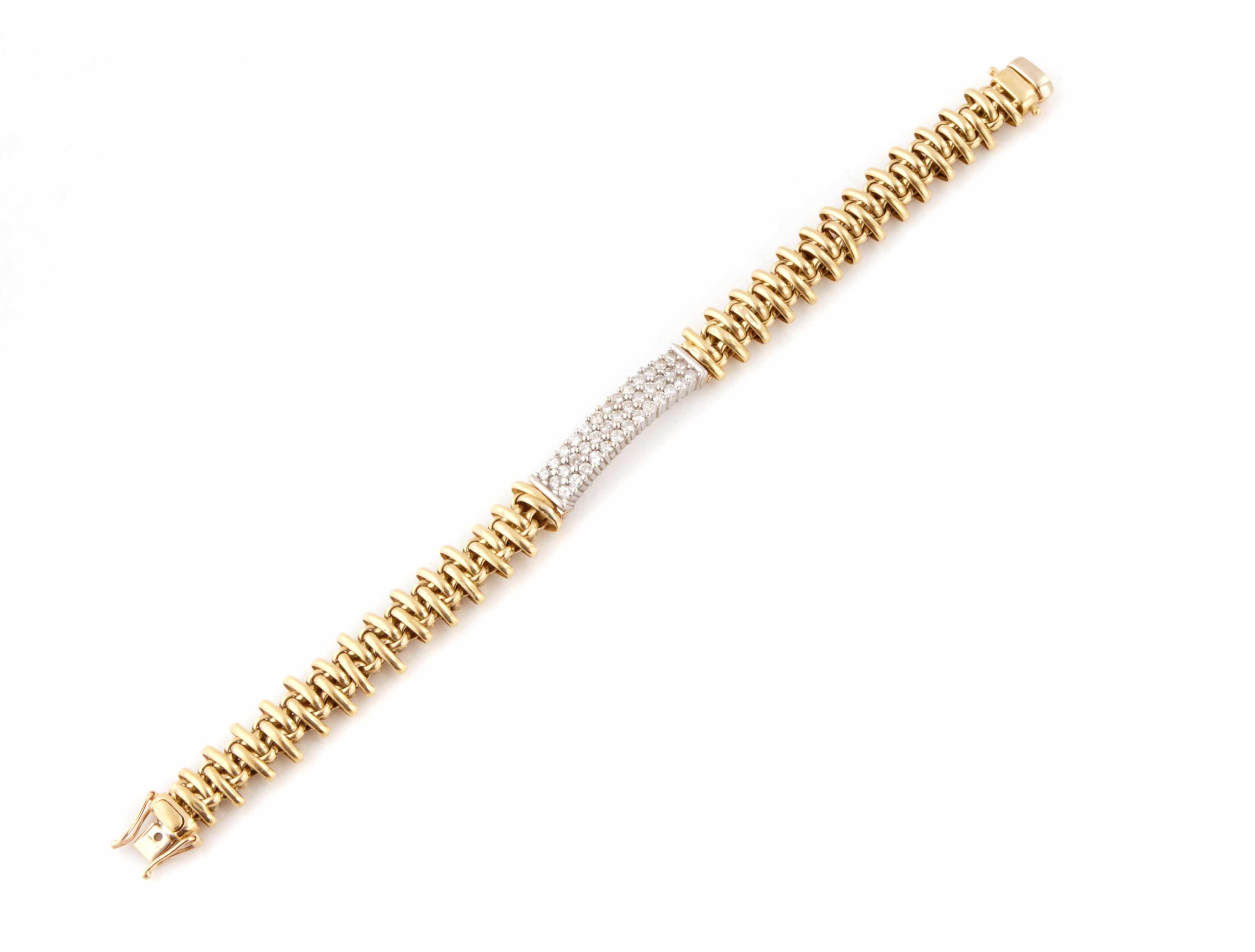 Appraisal: A diamond and k bicolor gold bracelet estimated total diamond