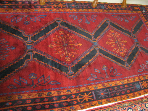 Appraisal: NORTHWEST PERSIAN TRIBAL CARPET hand knotted in an overall geometric