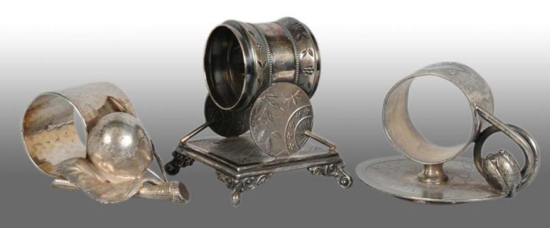 Appraisal: Lot of Figural Napkin Rings Description Includes a napkin holder