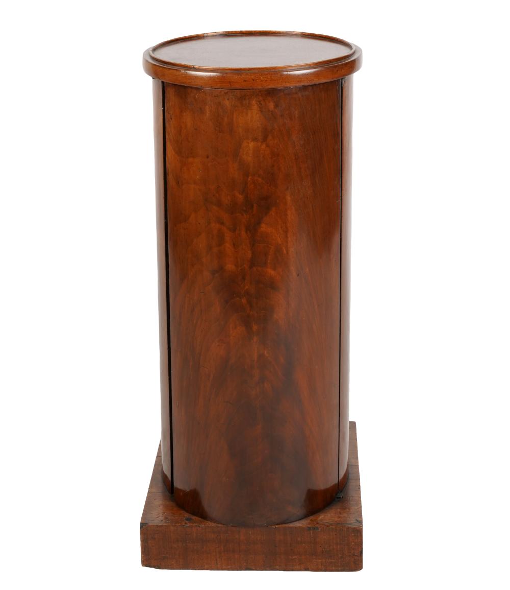 Appraisal: MAHOGANY PEDESTAL CABINETof cylindrical form fitted with one door enclosing