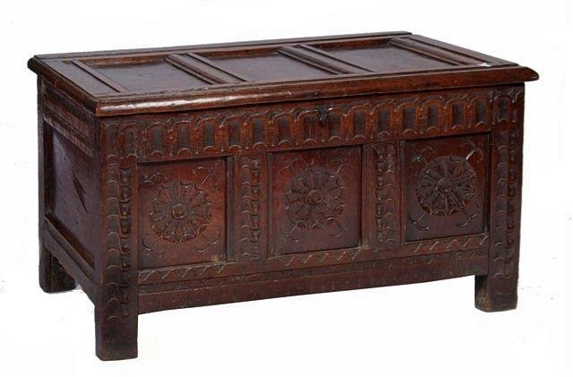 Appraisal: A TH TH CENTURY SMALL OAK COFFER with triple panelled