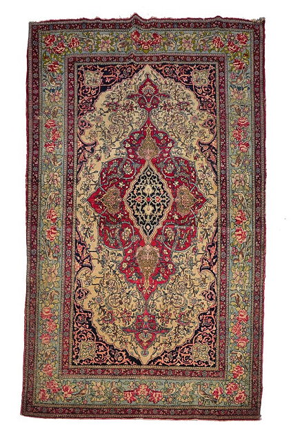 Appraisal: AN OLD PERSIAN ISFAHAN RUG with a central classical scrolling