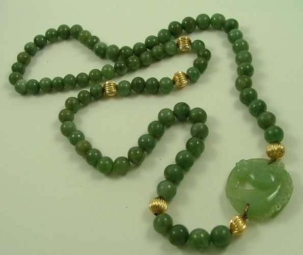 Appraisal: GREEN JADE AND EIGHTEEN KARAT GOLD NECKLACE - in length