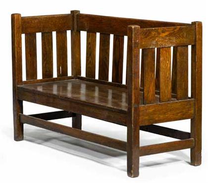 Appraisal: Mission style oak settle early th century With slightly bowed