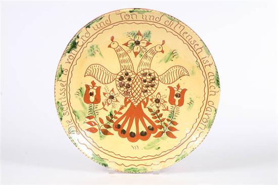 Appraisal: BREININGER POTTERY CHARGER Redware with sgraffito lovebird design and tulips