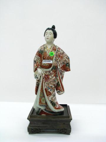 Appraisal: Ceramic statue depicting geisha inches high on wooden plinth